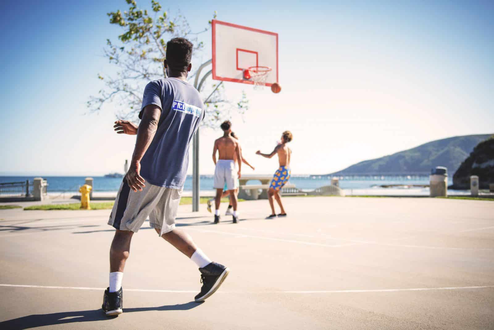 sports performance and physical therapy, men playing basketball