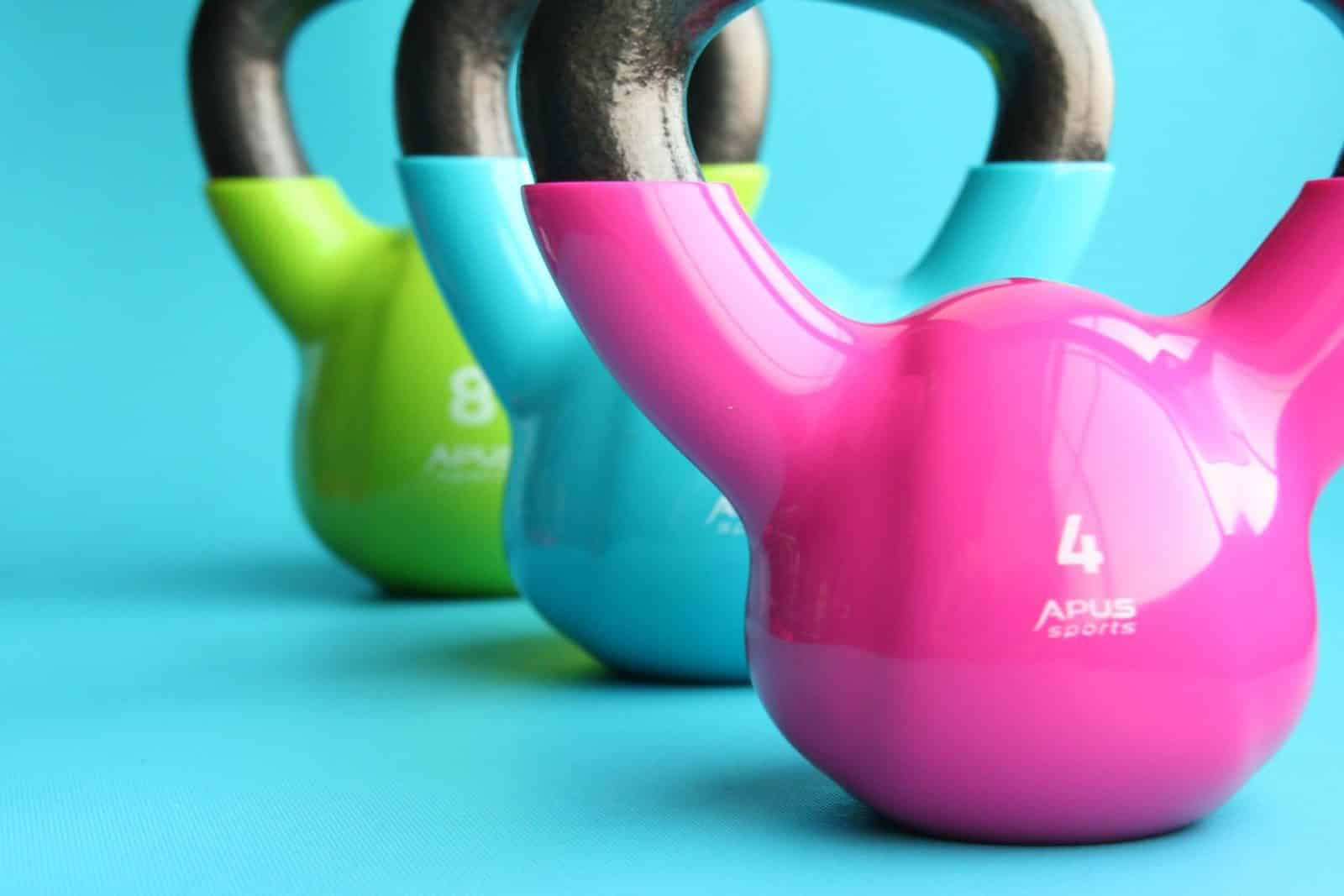 neon kettle bells blog image for blood flow restriction training