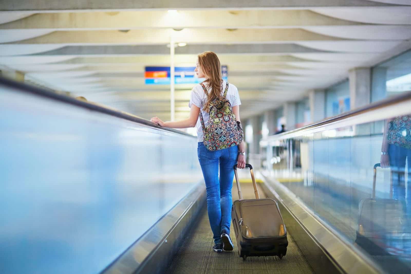 woman walking in airport