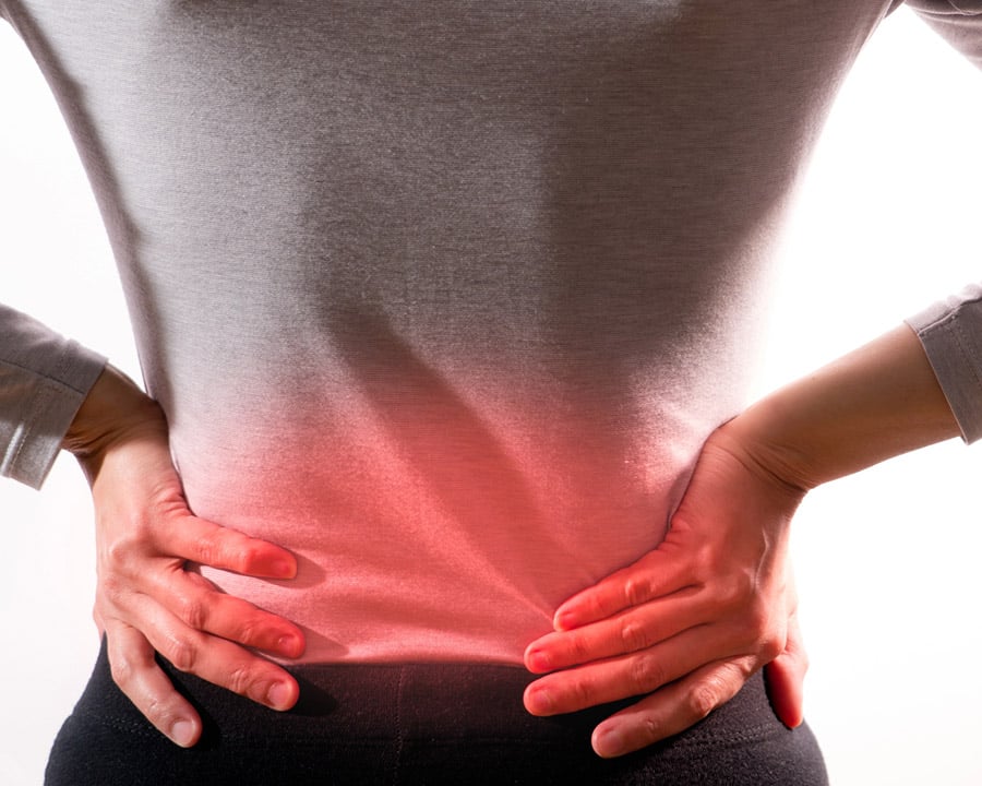 women suffering from sciatica and back pain