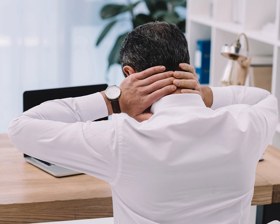 business man with neck pain
