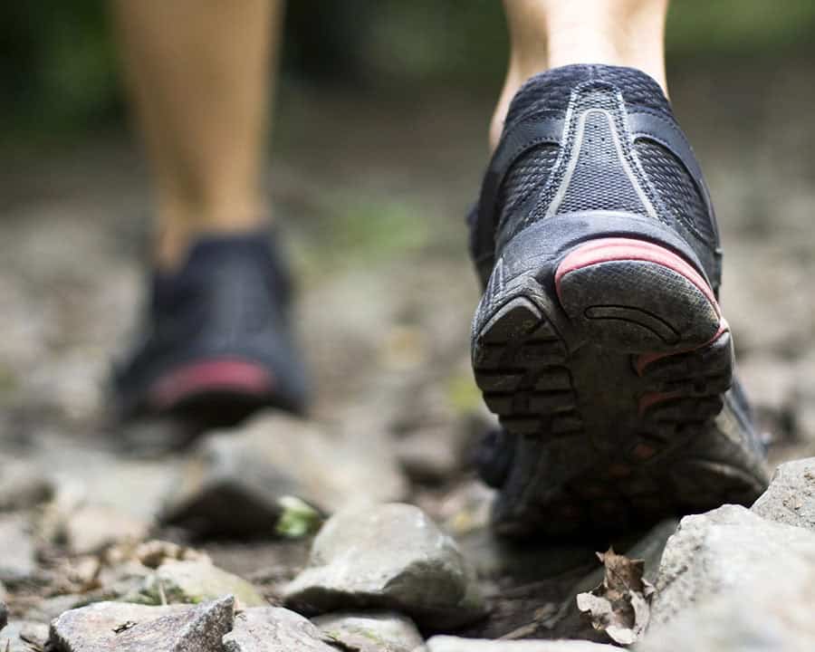 Trail walking in mountains