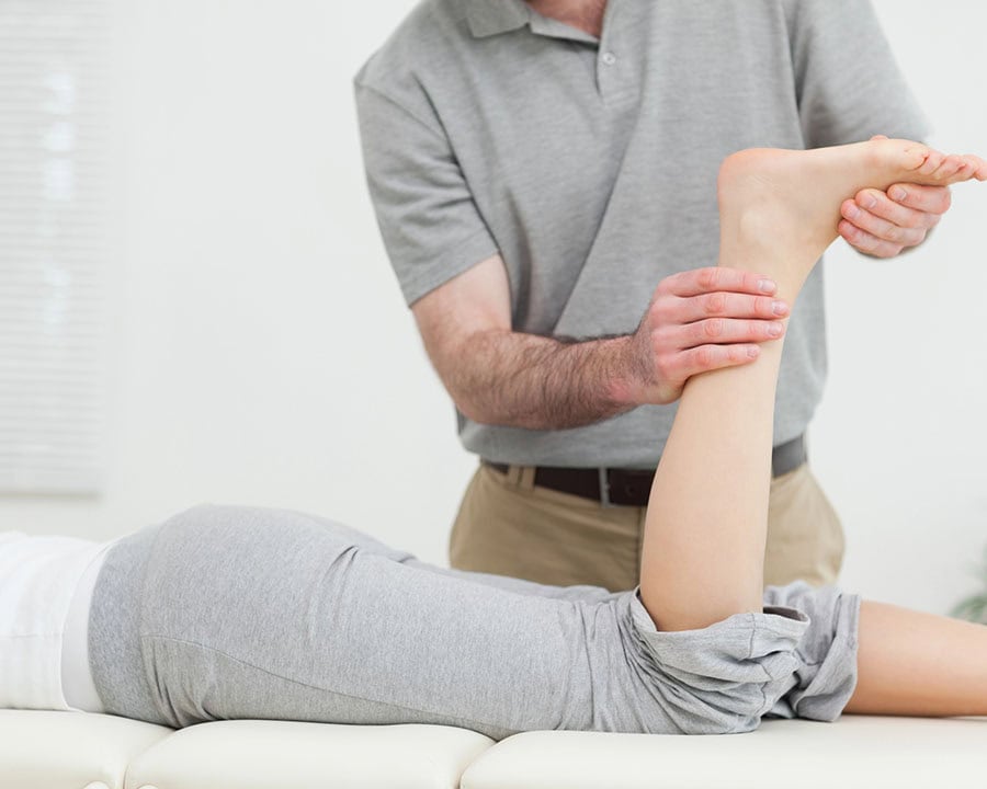 patient receiving treatment on their achilles tendon
