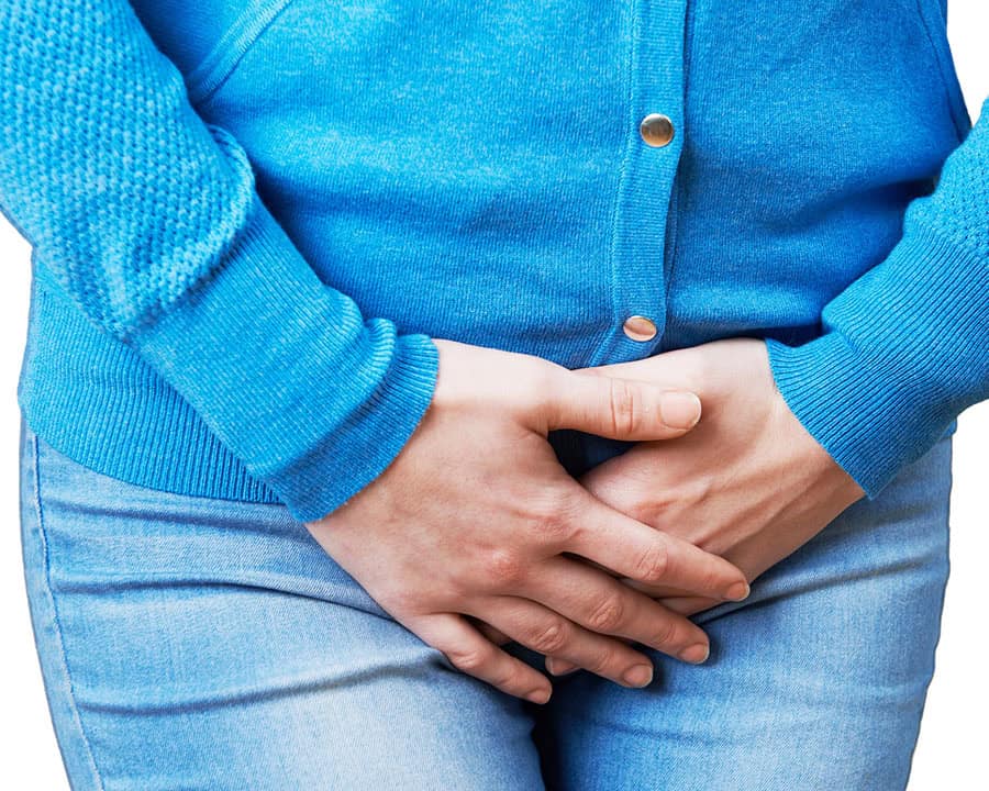 Close Up Of Woman Suffering From Bladder Problem