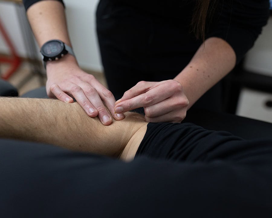 shockwave-treatment-on-knee forearm dry needling for tennis elbow