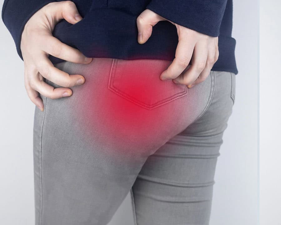 A woman suffers from pain in the hip and buttock.